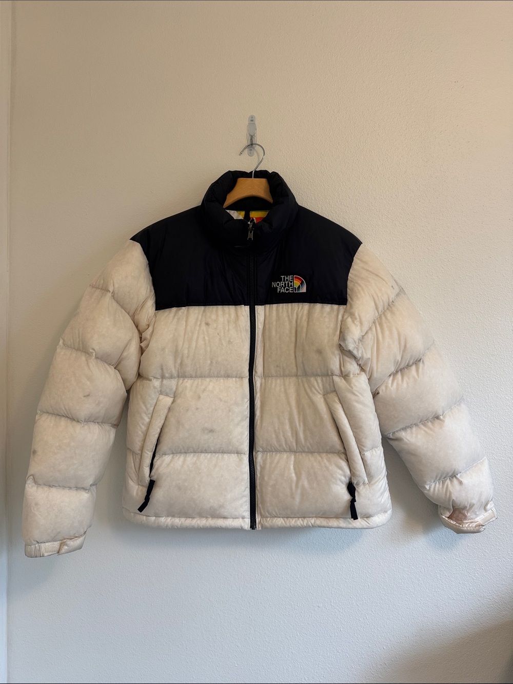 The North Face Pride Two-Tone Puffer Jacket in Cream and Black